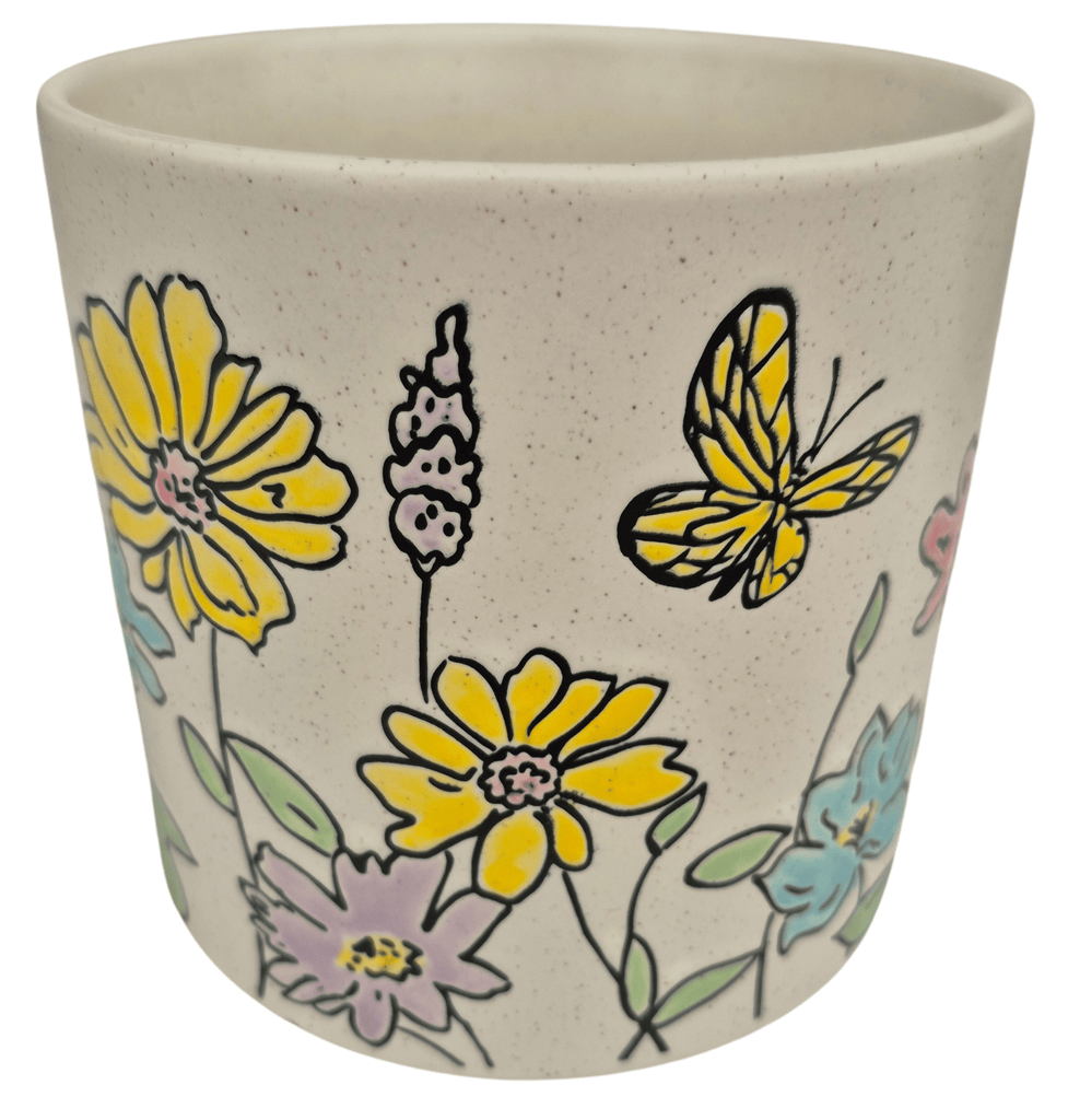 yellow plant pots Under The Sun_Clay planters 6.5 in / Spring Valley